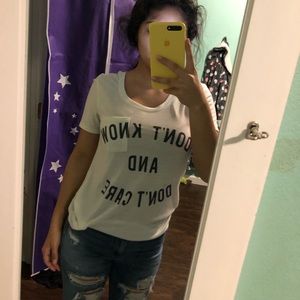 cream colored pocket tee with text